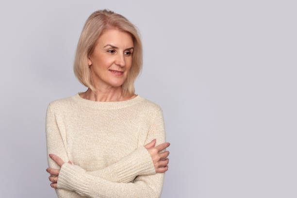 istock Beautiful old woman smiling. Isolated 871927230