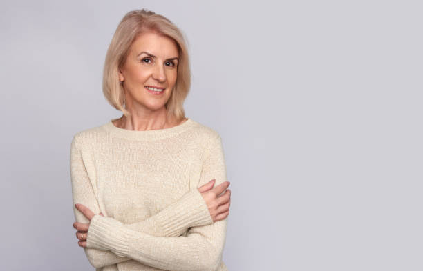 istock Beautiful old woman smiling. Isolated 871927334