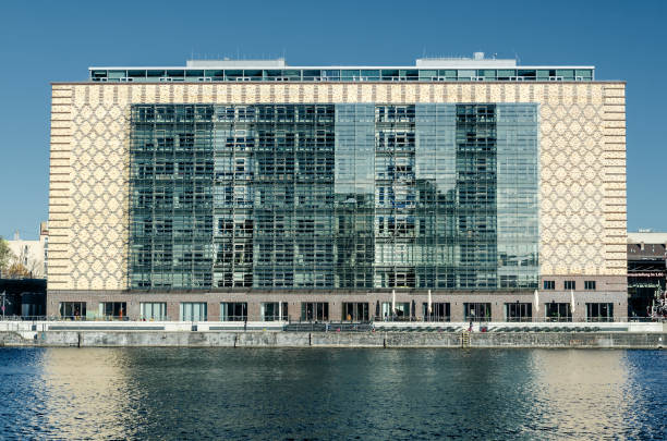 istock front of  a modern office building in berlin on the river spree 871930362