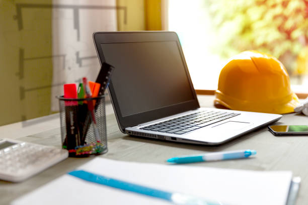 Best Laptop For Construction Contractors 12,900+ Laptop Construction Worker Stock Photos, Pictures & Royalty