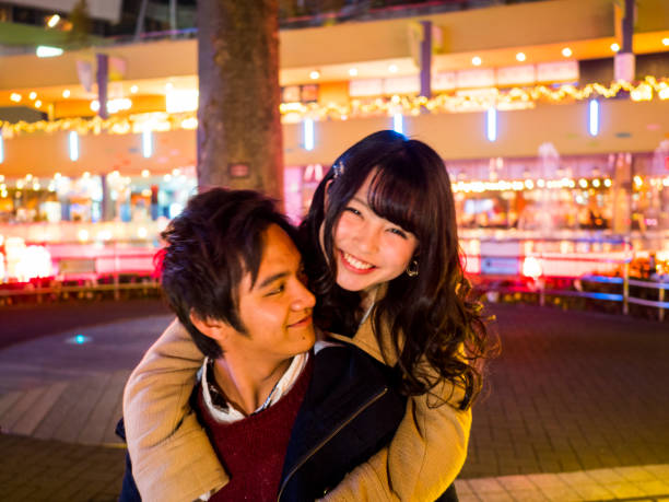 A Japanese high school girl dating a boyfriend. A Japanese high school girl dating a boyfriend. japanese girlfriends stock pictures, royalty-free photos & images