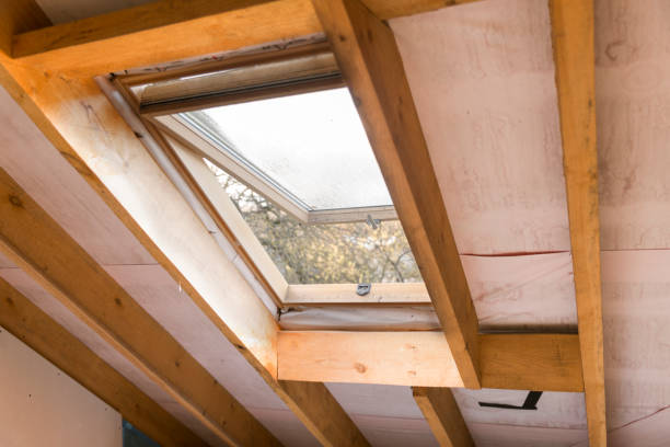 istock Wooden mansard or skylight window on attic. Attic renovation and insulation 871931748