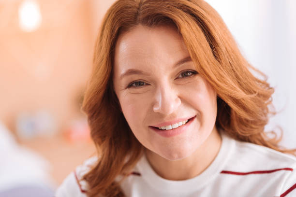 istock Pretty woman of middle age smiling 871935390