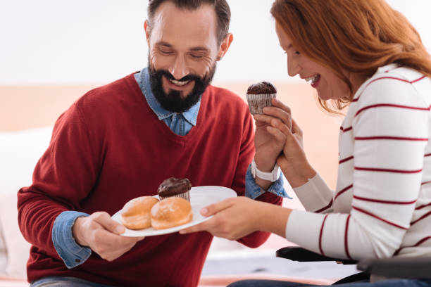 istock Content man and woman having cookies 871940082