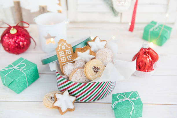 istock Christmas cookies in a striped cookie jar 871953126