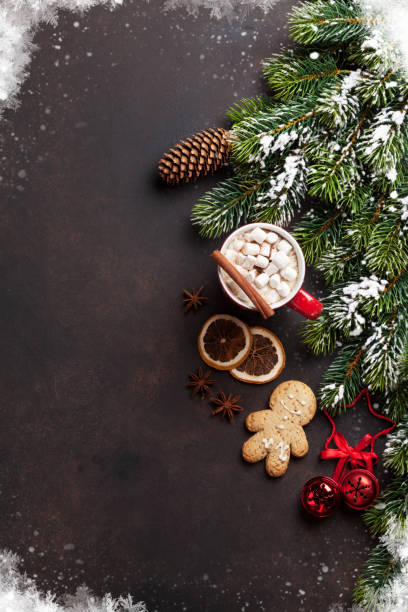 istock Christmas fir tree, hot chocolate and marshmallow 871955960