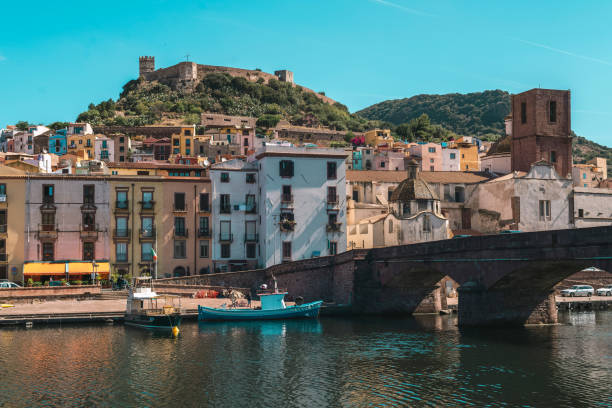 istock Bosa, Sardinia, Italy - June 15, 2017: Bridge over Temo River with old centre. 871963248