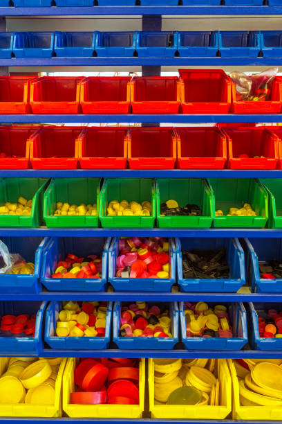 istock Colourful plastic bins and trays in storage room 871963728