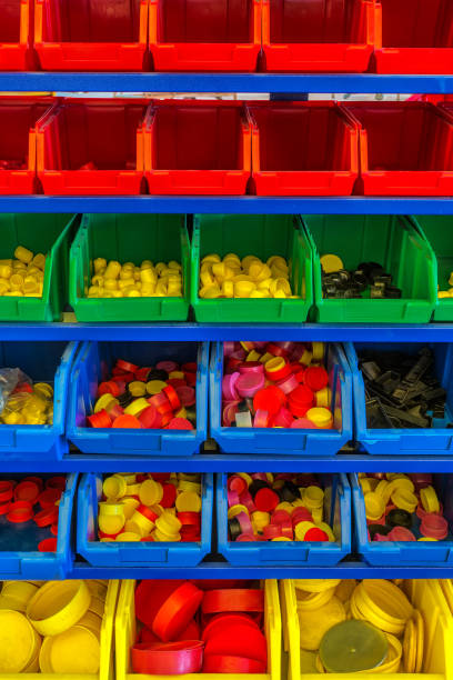 istock Colourful plastic bins and trays in storage room 871964084
