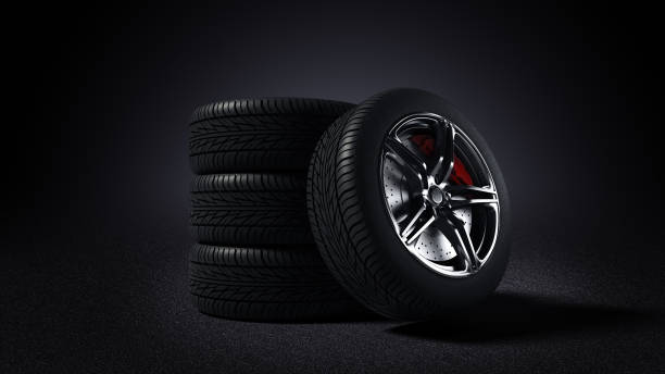 istock 3D illustration of car rim standing on asphalt 871966672