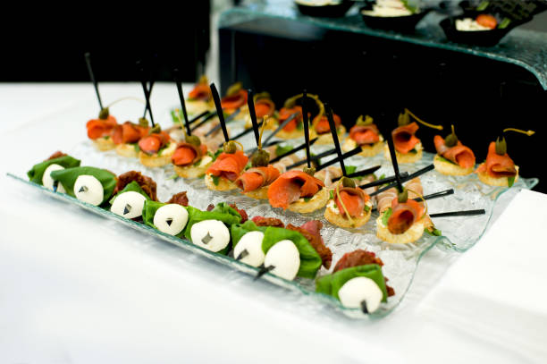 istock Cold snack with salmon, mozzarella and capers on skewers 871967486