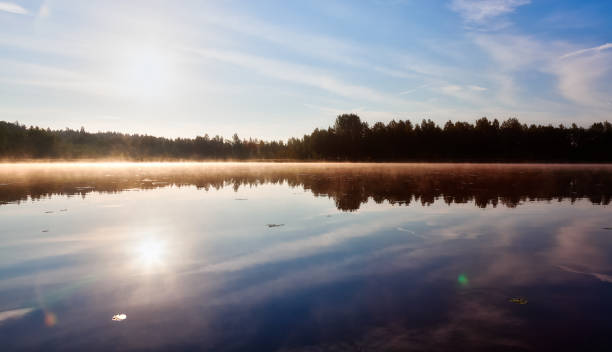 istock The mist hangs in the morning over the lake 871967510