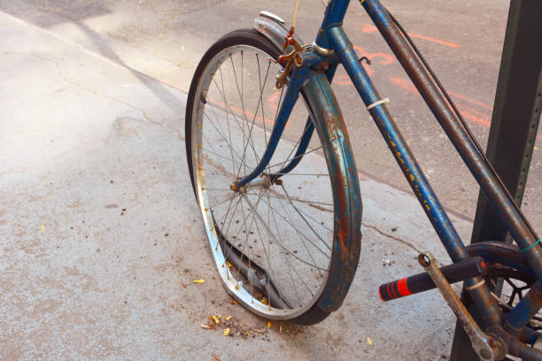 istock Loose tyre on abandoned, rusty bicycle 871970414