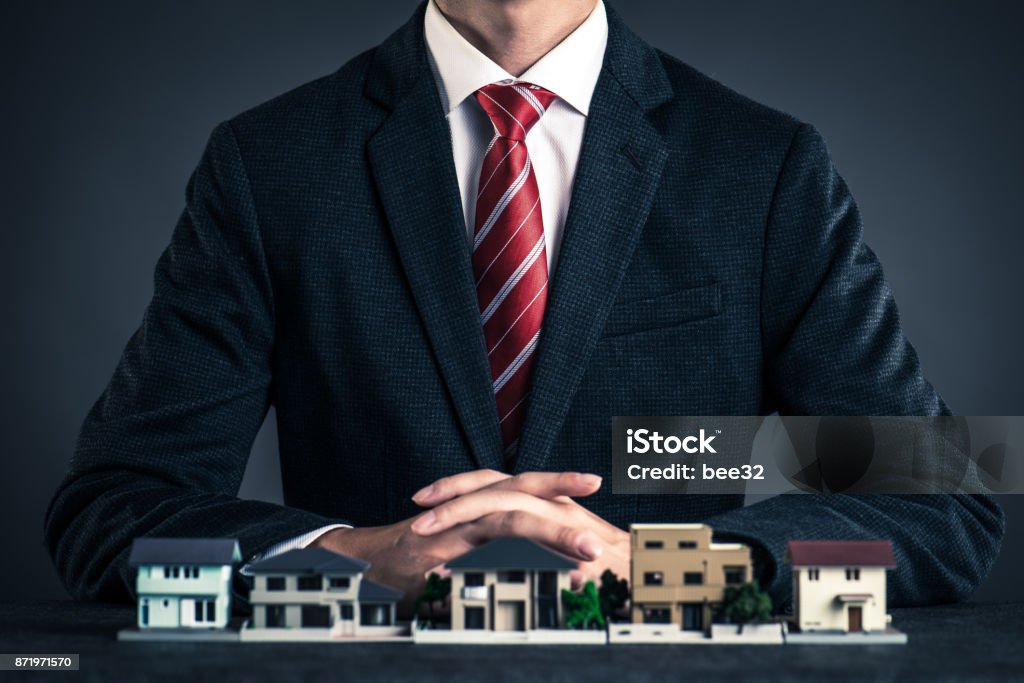 家の販売の実業家 - 不動産のロイヤリティフリーストックフォト