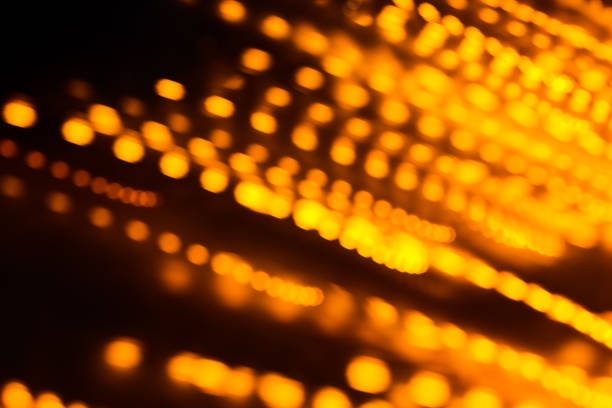 istock Yellow color light blurred bokeh background, unfocused. 871973324