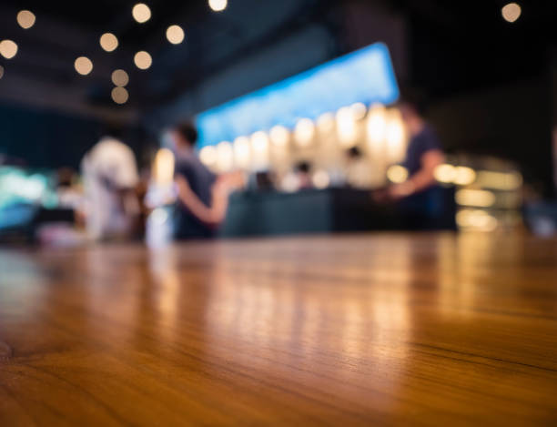 istock Table top Counter Blur Bar Restaurant people background 871976324