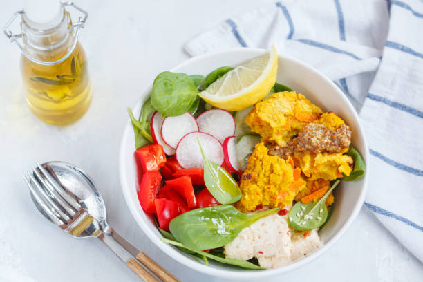 istock Vegan food: an open lentil burger with tofu and vegetables. 871981176