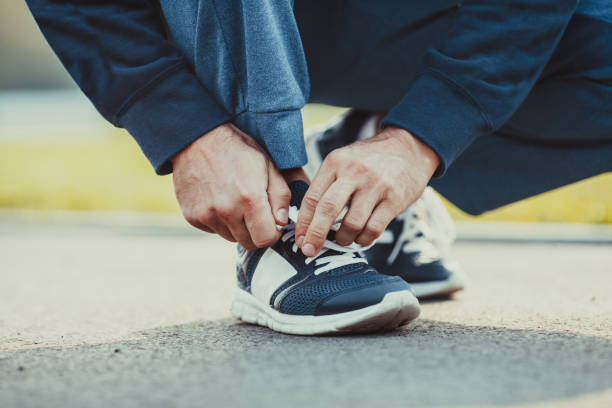 istock Tuning sport shoes before training 871984102