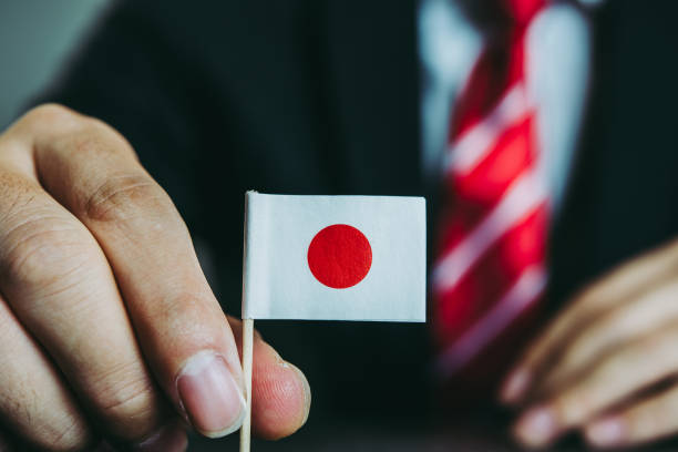istock Businessman and national flag 871984256