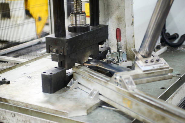 istock Robot bending pipe in modern factory 871984882