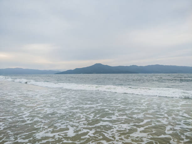 istock beach view over sea island and waves 871985034