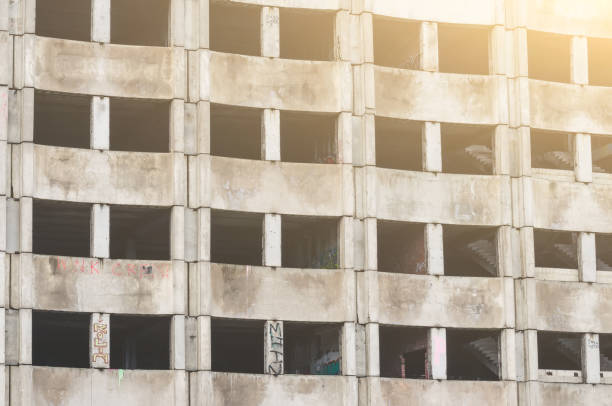 istock a window of an abandoned concrete building. 871985108