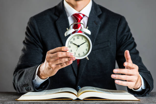 istock Businessman and alarm clock,studio shooting 871986012