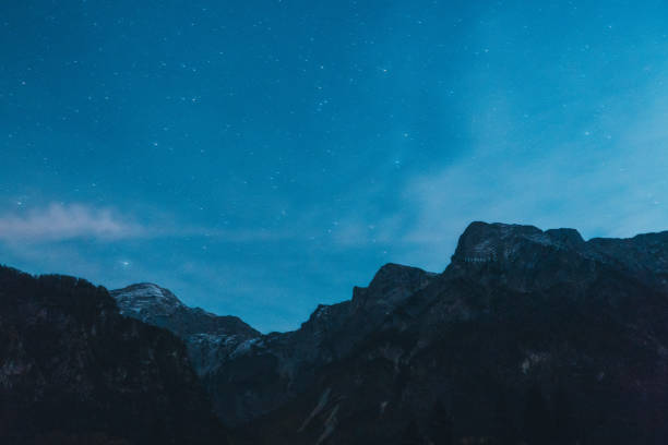 istock Starry sky over the mountains  in Alps 871993620