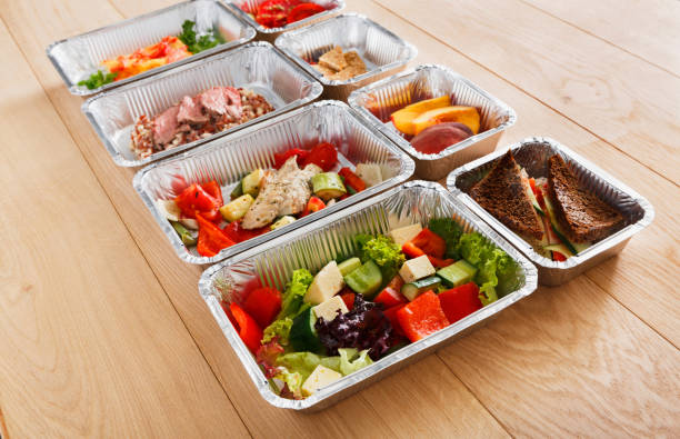 istock Healthy food in boxes, diet concept. 871993912