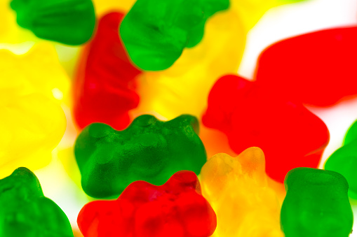 background with colorful gummy bears. The view from the top. Closeup