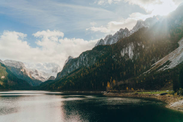 istock Scenic view of  lake in Alps, Austria 871997956