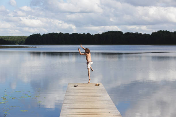 istock old wooden jetty at a lake 872016852