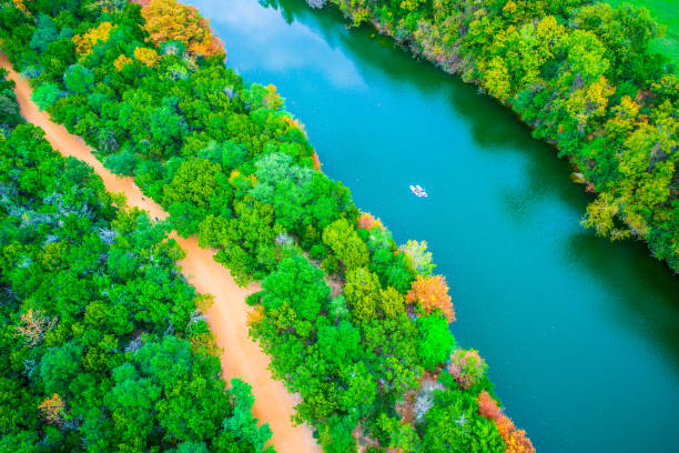 istock Dream landscape looking down on bright vibrant autumn river nature escape Fall comes to Austin Texas on the river 872026966