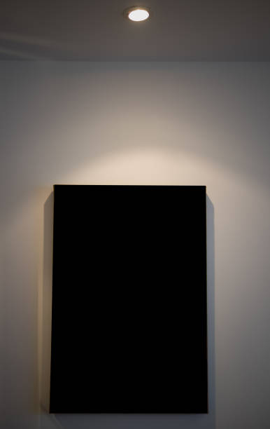 istock Empty picture frame in a room against a white wall 872042154