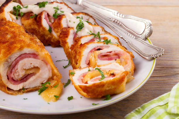 istock Chicken breasts with cheese and bacon. Crispy, creamy chicken wraps 872042158