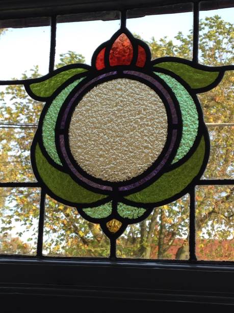 istock Arts and crafts glass window 1910s 872042292
