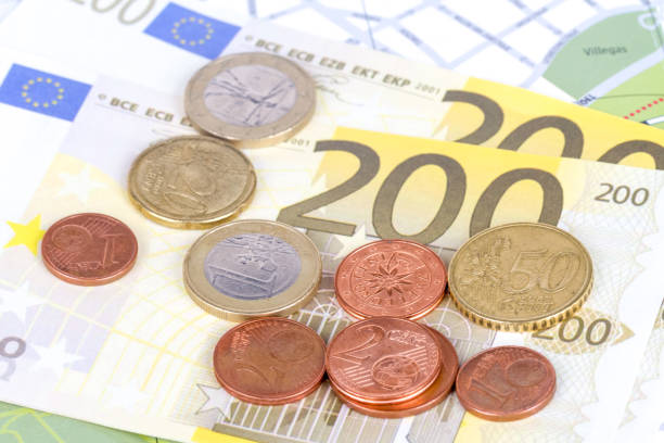 istock Euro Coins and Banknotes with Touristic Travel Map 872042988