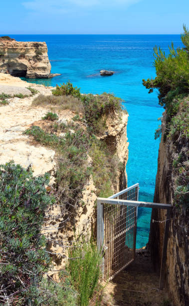 istock Faraglioni at Torre Sant Andrea, Italy 872048778