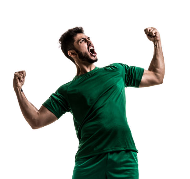 istock Fan / Sport Player on green uniform celebrating on white background 872049534