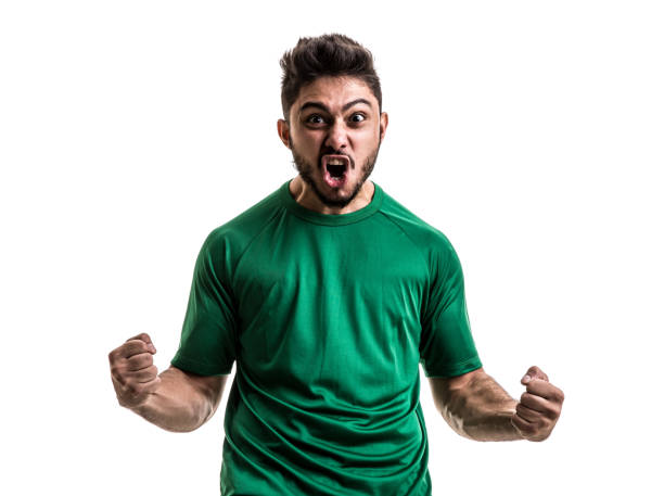 istock Fan / Sport Player on green uniform celebrating on white background 872049726