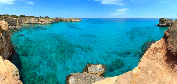 istock Faraglioni at Torre Sant Andrea, Italy 872050044