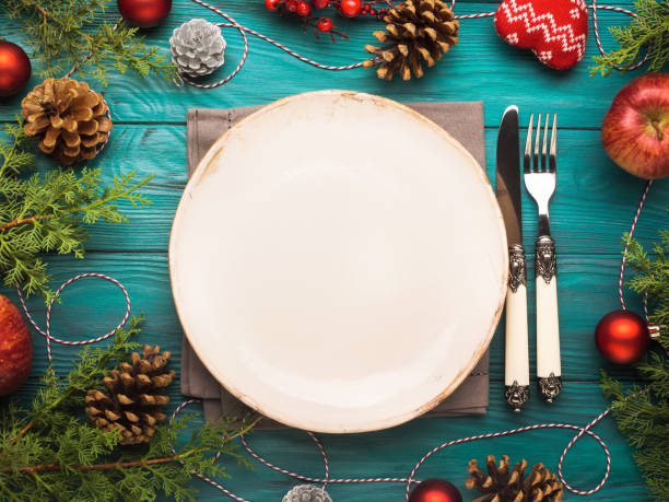 istock Christmas background with dish and cutlery 872057696