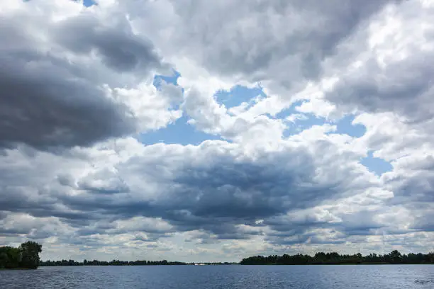 Photo of beautiful clouds over the water