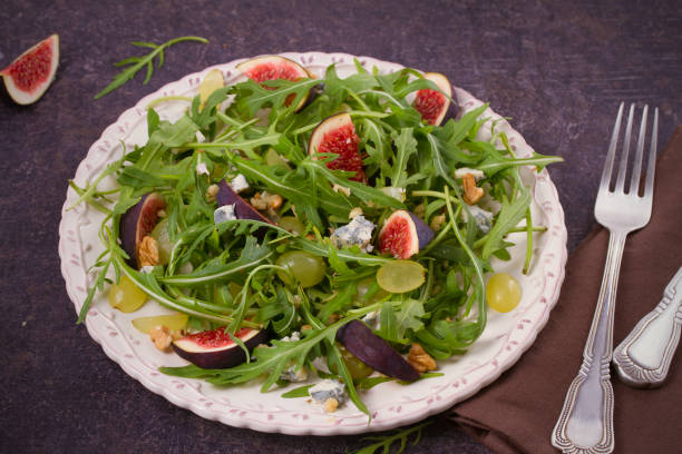 istock Grapes, figs, blue cheese, arugula and walnuts salad 872062854