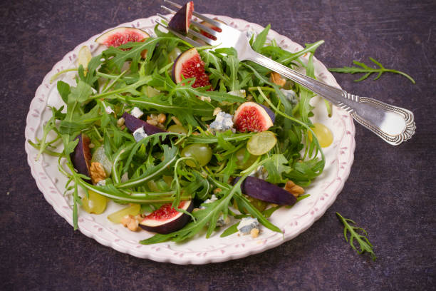 istock Grapes, figs, blue cheese, arugula and walnuts salad 872067038