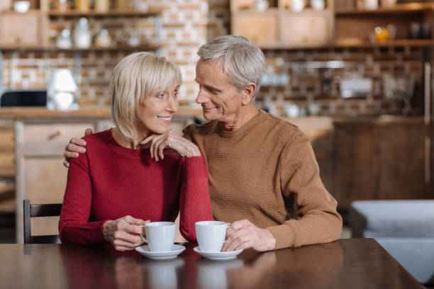 istock Adorable senior people having a romantic evening together 872067106
