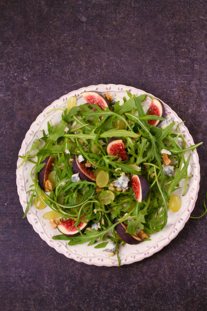 istock Grapes, figs, blue cheese, arugula and walnuts salad 872071690