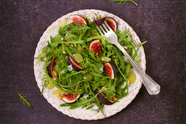 istock Grapes, figs, blue cheese, arugula and walnuts salad 872073314