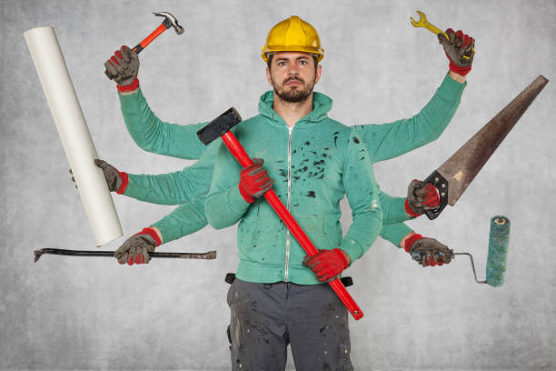 istock Multitasking specialist with a large number of hands and tools 872074284