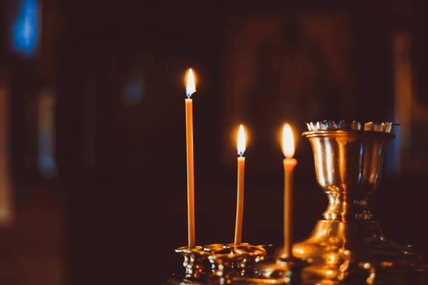 istock candles in the Church 872082364